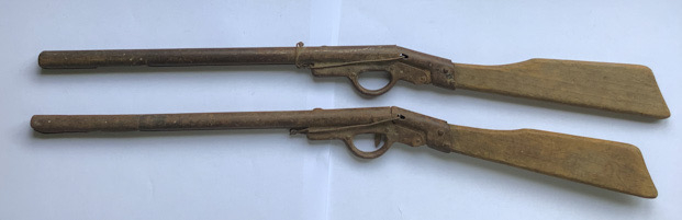 antique pair potato or cork firing gun toys